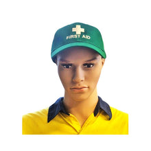 Load image into Gallery viewer, Person wearing a green 'First Aid' cap on a white background