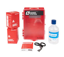 Load image into Gallery viewer, Emergency burn station kit with red module, scissors, eye wash bottle, and other supplies on a white background.
